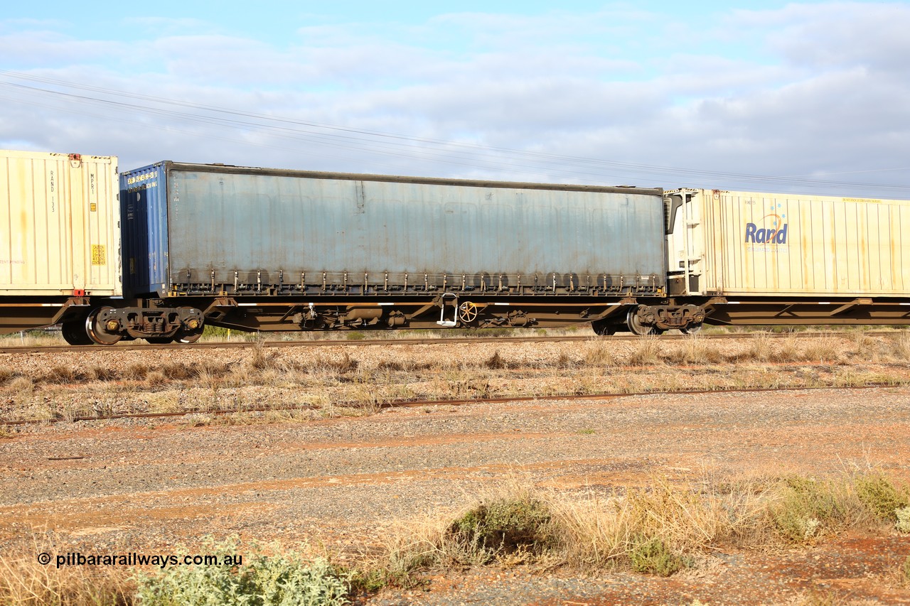 160525 4542
Parkeston, 3PM7 priority service train, RRQY 7330 platform 3 of 5-pack articulated skel waggon, one of sixteen sets built by Qiqihar Rollingstock Works China in 2005, 48' deck with a 48' Pacific National curtainsider PNXM 4533.
Keywords: RRQY-type;RRQY7330;Qiqihar-Rollingstock-Works-China;