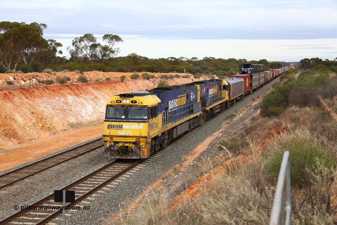 160526 5201
West Kalgoorlie, Melbourne bound intermodal train 4PM6 arrives with Binduli in the distance behind Goninan built GE model Cv40-9i NR class units NR 71 serial 7250-01/97-273 and NR 12 serial 7250-02/97-214.
Keywords: NR-class;NR71;Goninan;GE;Cv40-9i;7250-01/97-273;