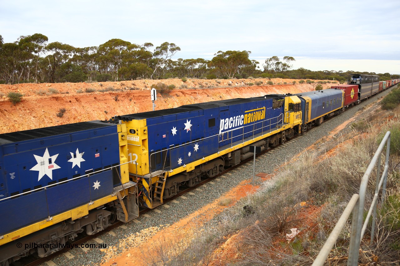 160526 5202
West Kalgoorlie, Melbourne bound intermodal train 4PM6 Goninan built GE model Cv40-9i NR class unit NR 12 serial 7250-02/97-214.
Keywords: NR-class;NR12;Goninan;GE;Cv40-9i;7250-02/97-214;