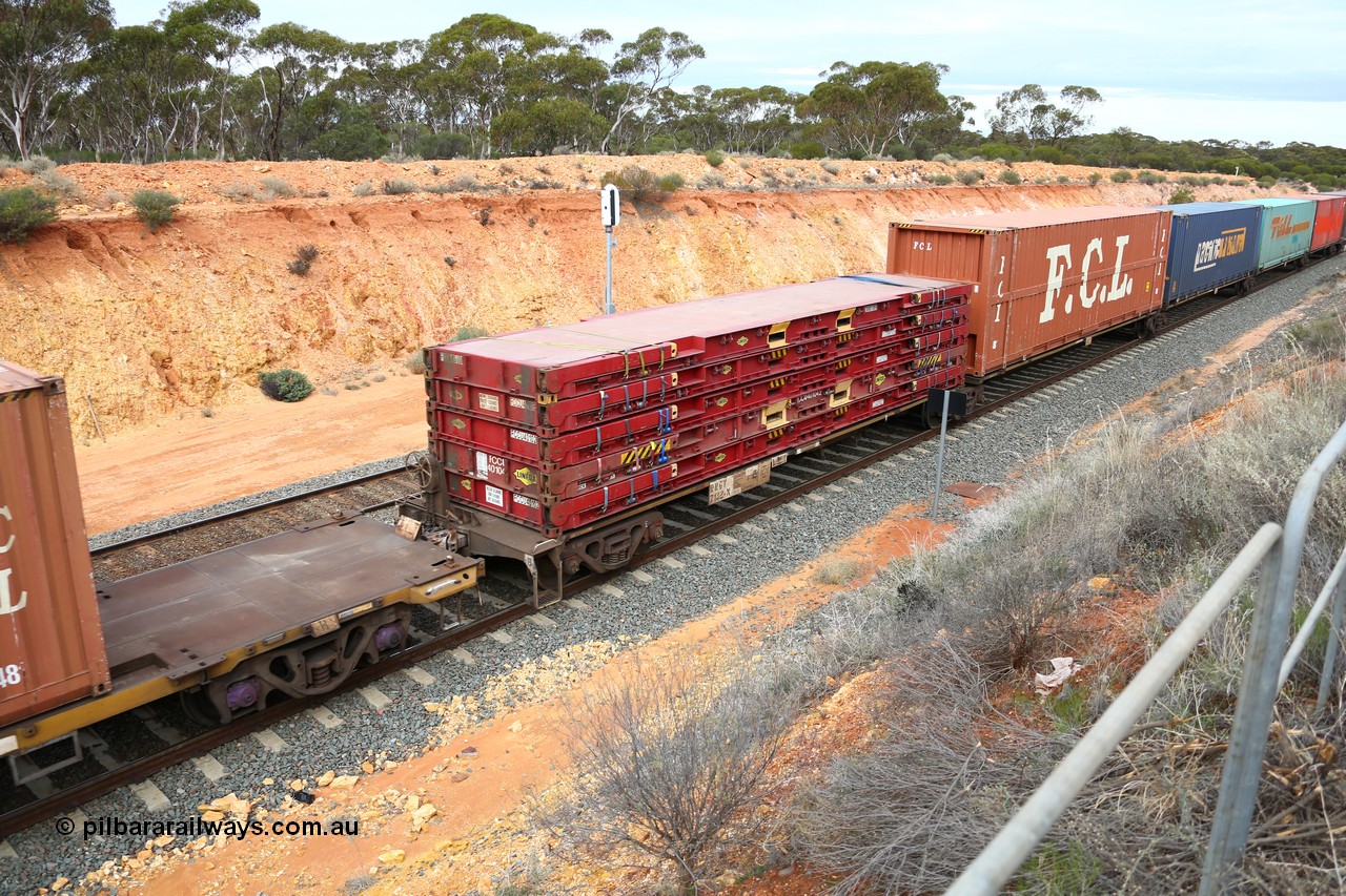 160526 5208
West Kalgoorlie, 4PM6 intermodal train, RRGY 7132 platform 5-pack articulated skel waggon, one of fifty originally built by AN Rail Islington Workshops in 1996-97 as class RRBY, later rebuilt with 48' intermediate decks and coded RRGY, 40' deck, with 40' Linfox flatracks, an FCL 48' high cube, PN and Toll 48' boxes and an 40' box on the end.
Keywords: RRGY-type;RRGY7132;AN-Islington-WS;RRBY-type;