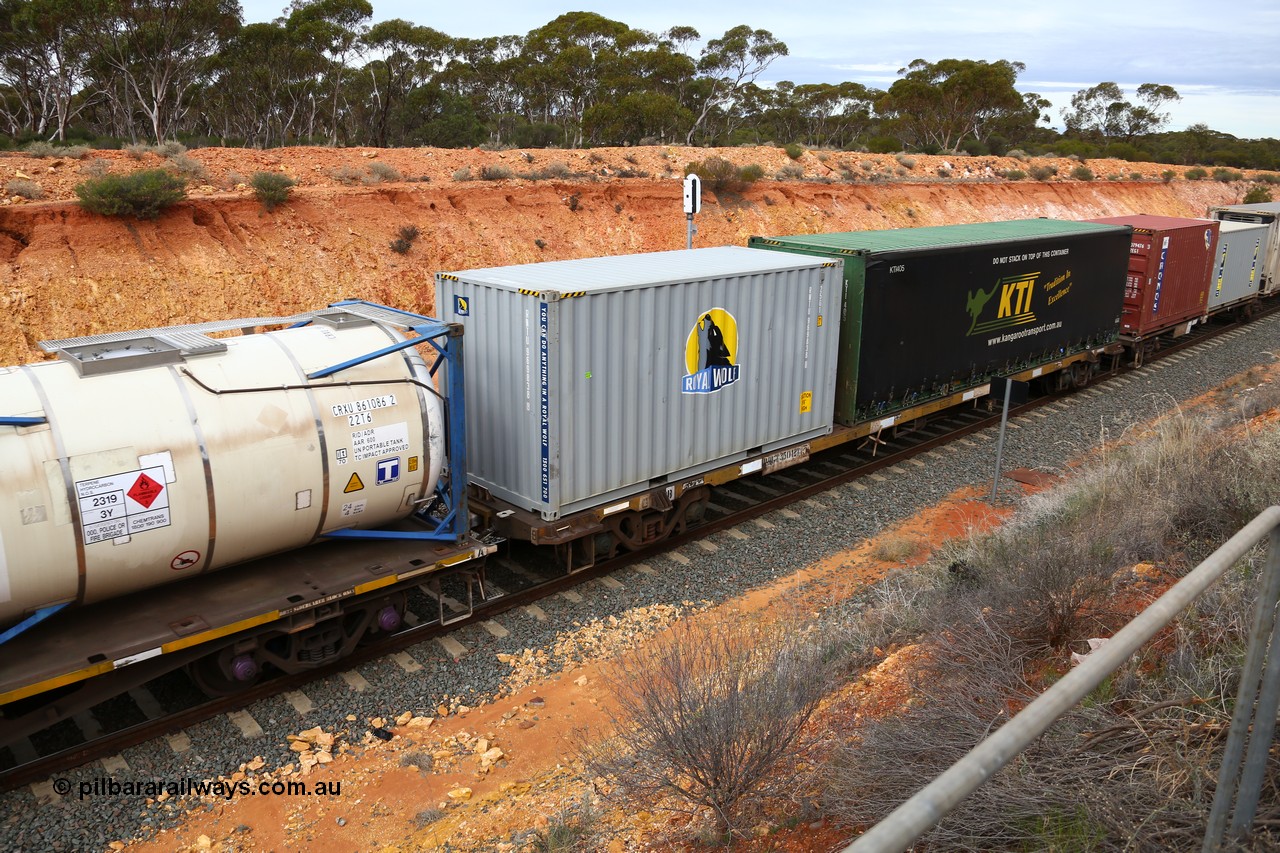 160526 5211
West Kalgoorlie, 4PM6 intermodal train, RQGY 35012 container waggon, one of a batch of one hundred built by Goninan NSW in 1975 as OCY class, recoded to NQOY, then NQSY, 20' Royal Wolf box RWTU 969838 and a 40' curtainsider for KTI, KTI 405.
Keywords: RQGY-type;RQGY35012;Goninan-NSW;OCY-type;NQOY-type;NQSY-type;