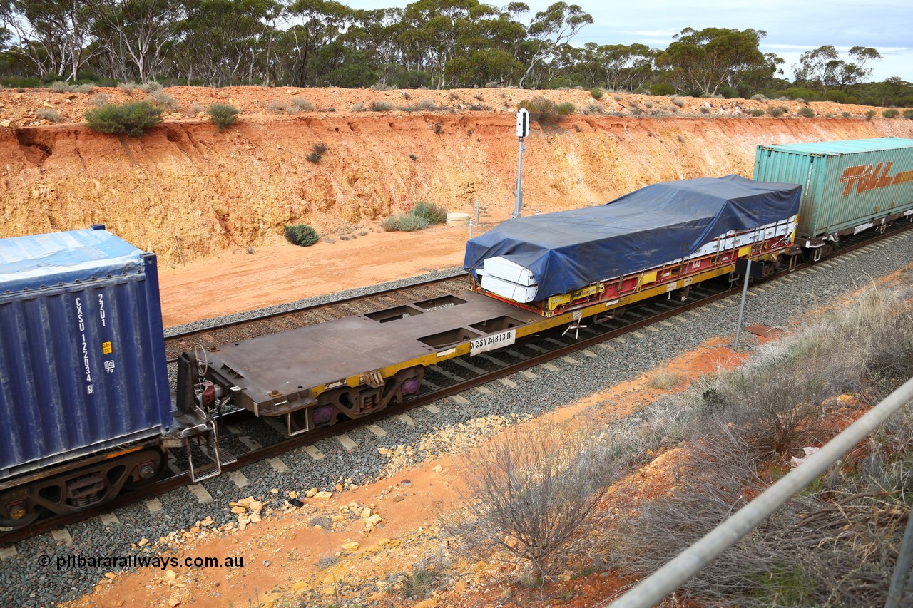 160526 5213
West Kalgoorlie, 4PM6 intermodal train, NQSY 34313 container waggon, one of a batch of one hundred built by Goninan NSW in 1974-75 as OCY class, recoded to NQOY, K+S 40' flatrack KHS 400631 loaded with timber products.
Keywords: NQSY-type;NQSY34313;Goninan-NSW;OCY-type;NQOY-type;