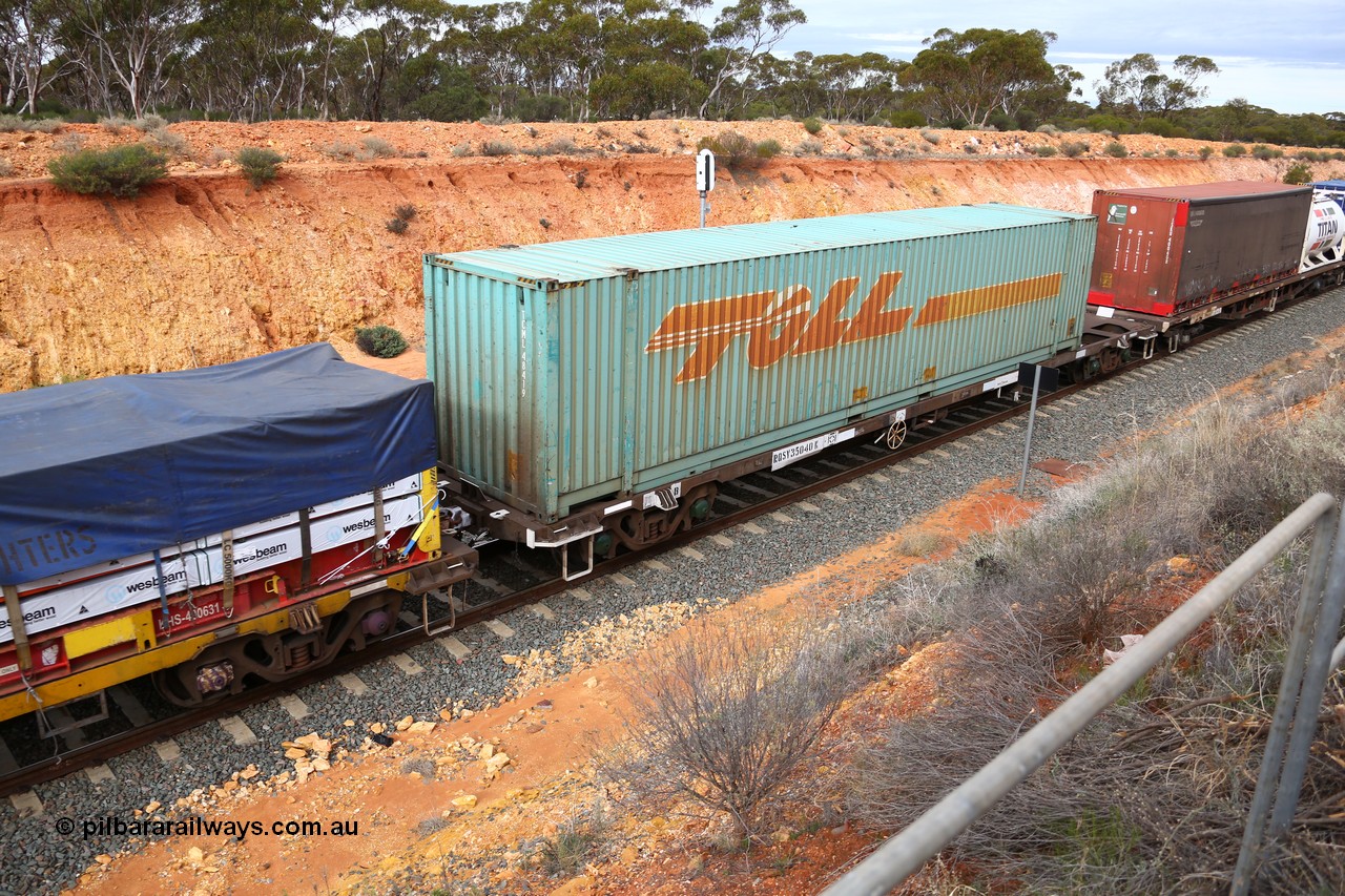 160526 5214
West Kalgoorlie, 4PM6 intermodal train, RQSY 35040 container waggon, one of a batch of one hundred built by Goninan NSW in 1975 as OCY class, recoded to NQOY, then NQSY, 48' Toll box TCML 48419.
Keywords: RQSY-type;RQSY35040;Goninan-NSW;OCY-type;NQOY-type;NQSY-type;