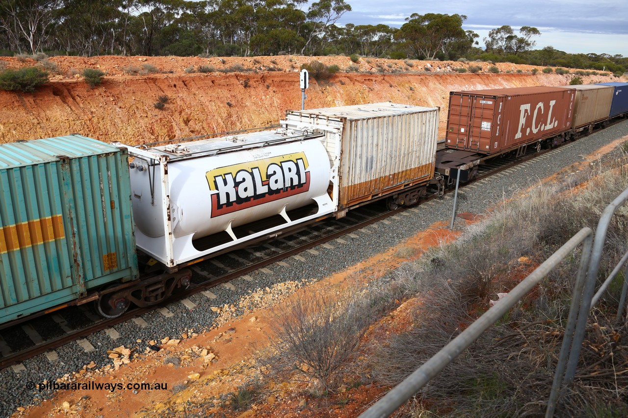 160526 5217
West Kalgoorlie, 4PM6 intermodal train, RRAY 7216 platform 1 of 5-pack articulated skel waggon set, one of 100 built by ABB Engineering NSW 1996-2000, 40' deck with a Jamieson built 20' Kalari tanktainer K8119, and a 20' bulker box NB 29530
Keywords: RRAY-type;RRAY7216;ABB-Engineering-NSW;