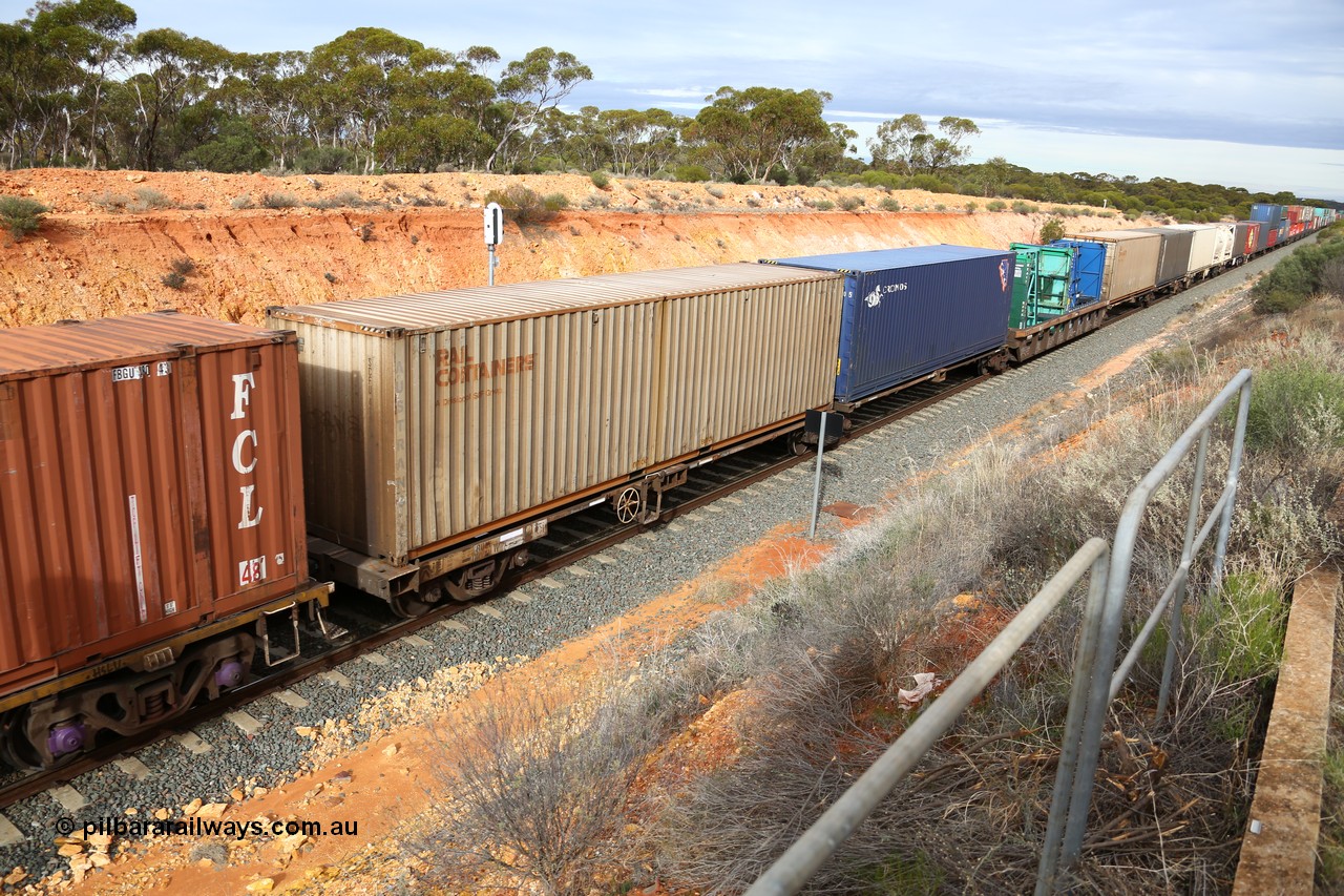 160526 5219
West Kalgoorlie, 4PM6 intermodal train, RQLY 1009 articulated 5-pack centre well waggon set, one of fourteen sets built by AN Rail Islington Workshops SA in 1991, loaded with 40' containers and two 20' high glass plate containers in well.
Keywords: RQLY-type;RQLY1009;AN-Islington-WS;AQLY-type;