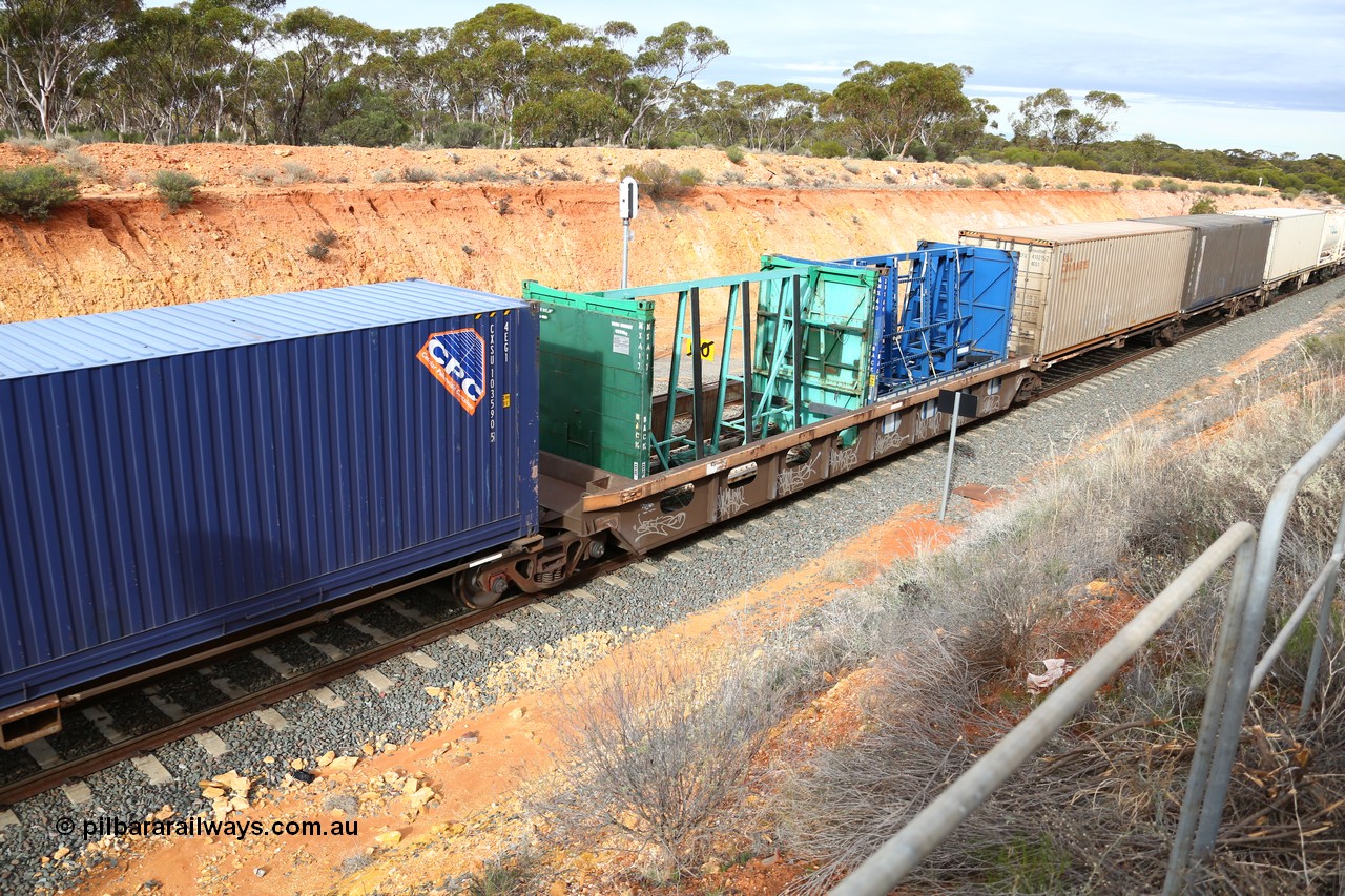 160526 5220
West Kalgoorlie, 4PM6 intermodal train, RQLY 1009 centre well of articulated 5-pack centre well waggon set, one of fourteen sets built by AN Rail Islington Workshops SA in 1991, loaded with former Pilkington Glass 20' plate glass carriers now MXA 17 and AMX 40.
Keywords: RQLY-type;RQLY1009;AN-Islington-WS;AQLY-type;