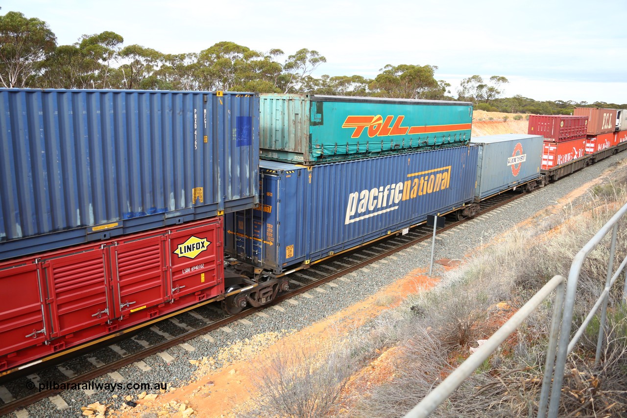 160526 5224
West Kalgoorlie, 4PM6 intermodal train, RRAY 7260 platform 4 of 5-pack articulated skel waggon set, one of a hundred built by ABB Engineering NSW in 1996-2000, 48' deck with a 48' Pacific National box PNXD 4187 with a Toll half height 40' curtainsider 5TC 528 on top.
Keywords: RRAY-type;RRAY7260;ABB-Engineering-NSW;