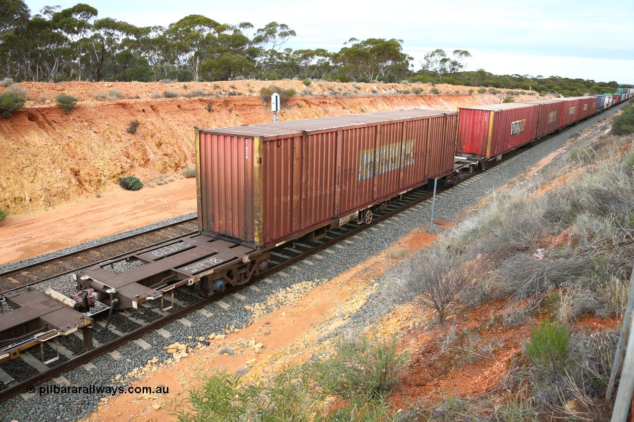 160526 5238
West Kalgoorlie, 4PM6 intermodal train, RQJW 21978 80' container waggon, one of twenty five built by Mittagong Engineering NSW as JCW type in 1980, 53' Patrick automobile container C 024.
Keywords: RQJW-type;RQJW21978;Mittagong-Engineering-NSW;JCW-type;NQJW-type;