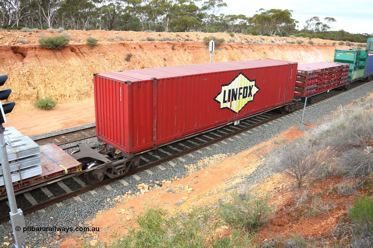 160526 5243
West Kalgoorlie, 4PM6 intermodal train, RRGY 7119 platform 3 of 5-pack articulated skel waggon, one of fifty originally built by AN Rail Islington Workshops in 1996-97 as class RRBY, later rebuilt with 48' intermediate decks and coded RRGY, 48' deck with a 48' Linfox box DRC 918.
Keywords: RRGY-type;RRGY7119;AN-Islington-WS;RRBY-type;