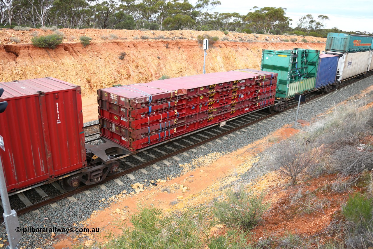 160526 5244
West Kalgoorlie, 4PM6 intermodal train, RRGY 7119 platform 2 of 5-pack articulated skel waggon, one of fifty originally built by AN Rail Islington Workshops in 1996-97 as class RRBY, later rebuilt with 48' intermediate decks and coded RRGY, 48' deck with a stack of five Linfox 40' FCCU class flatracks.
Keywords: RRGY-type;RRGY7119;AN-Islington-WS;RRBY-type;