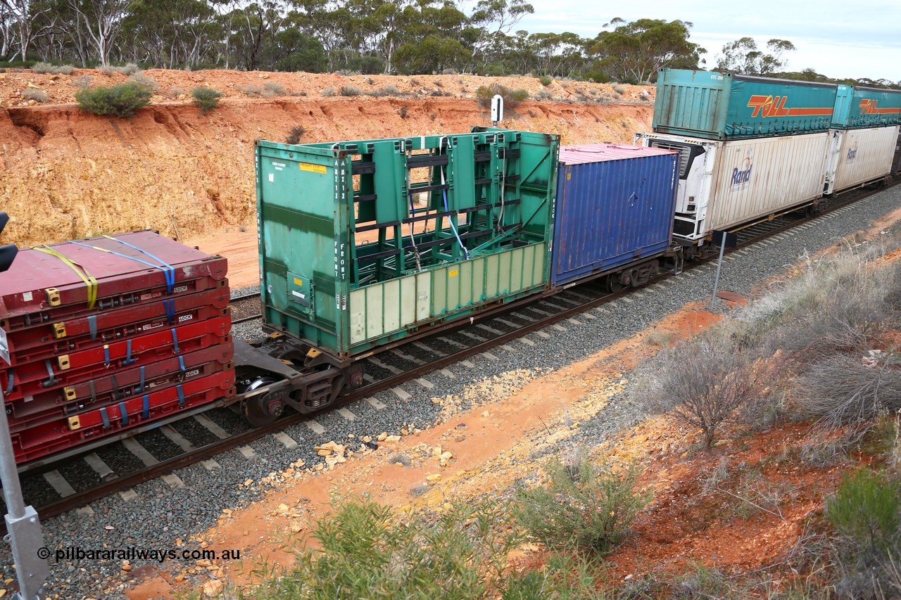 160526 5245
West Kalgoorlie, 4PM6 intermodal train, RRGY 7119 platform 1 of 5-pack articulated skel waggon, one of fifty originally built by AN Rail Islington Workshops in 1996-97 as class RRBY, later rebuilt with 48' intermediate decks and coded RRGY, 40' deck with a 20' former Pilkington Glass plate carrier now AMX 12 and a 20' bulk box RTP 2057.
Keywords: RRGY-type;RRGY7119;AN-Islington-WS;RRBY-type;