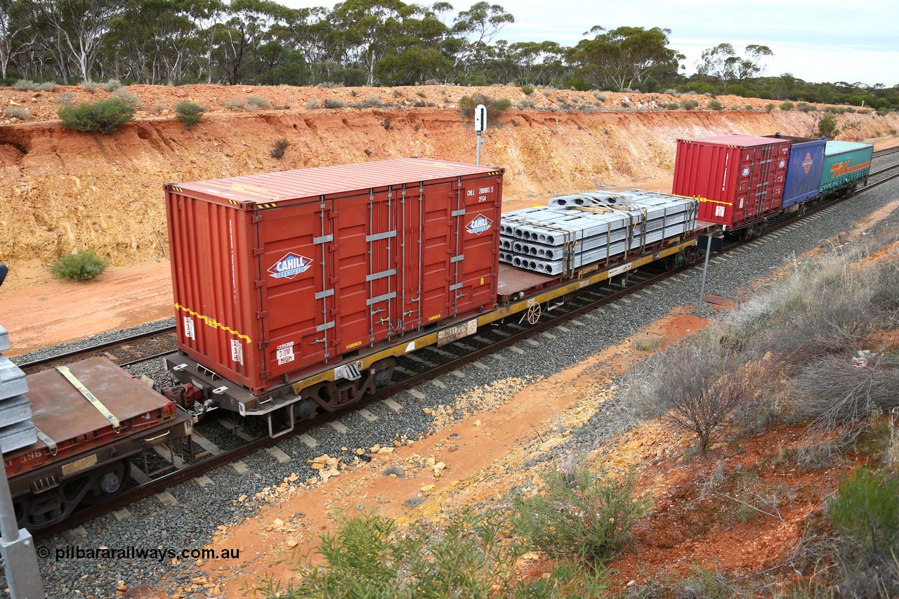 160526 5250
West Kalgoorlie, 4PM6 intermodal train, RQSY 34328 container waggon, one of one hundred built by Goninan NSW as OCY class in 1974-75, recoded to NQOY then NQSY, with a 20' Cahill side door CHLL 200003 and a 40' KT 400### series flatrack with concrete panels.
Keywords: RQSY-type;RQSY34328;Goninan-NSW;OCY-type;NQOY-type;NQSY-type;