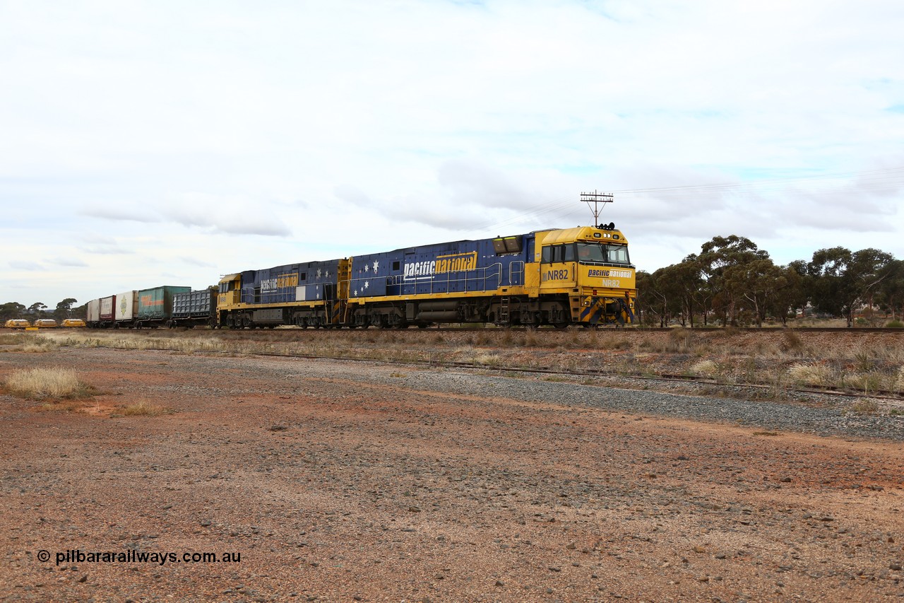 160526 5254
Parkeston, 3MP7 priority service train runs upgrade around the curve bound for Kalgoorlie and Perth behind Goninan built GE model Cv40-9i NR class units NR 82 serial 7250-03/97-284 and NR 49 serial 7250-08/97-251.
Keywords: NR-class;NR82;Goninan;GE;Cv40-9i;7250-03/97-284;