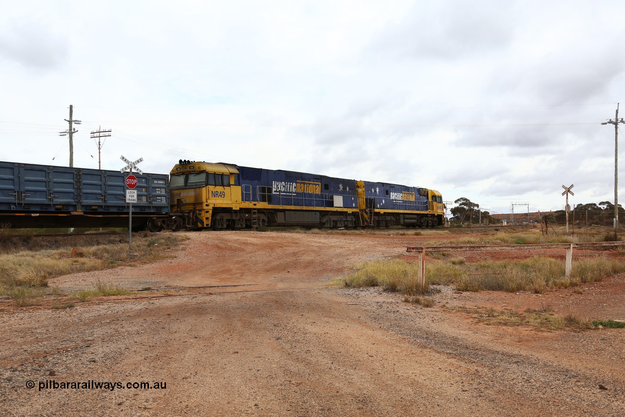160526 5255
Parkeston, 3MP7 priority service train runs upgrade around the curve bound for Kalgoorlie and Perth behind Goninan built GE model Cv40-9i NR class units NR 82 serial 7250-03/97-284 and NR 49 serial 7250-08/97-251. Trailing view with gauge check in the distance.
Keywords: NR-class;NR49;Goninan;GE;Cv40-9i;7250-08/97-251;