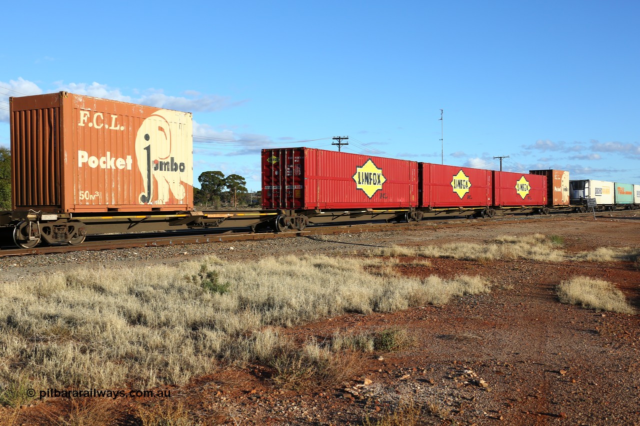 160528 8323
Parkeston, priority service 6PS7, RQQY 7083 5-pack articulated skel waggon set, one of seventeen sets built by Qld Rail at Ipswich Workshops in 1995, loaded with two 20' FCL Pocket Jumbo 50 m3 boxes and three MFG1 type 48' Linfox - FCL boxes.
Keywords: RQQY-type;RQQY7083;Qld-Rail-Ipswich-WS;