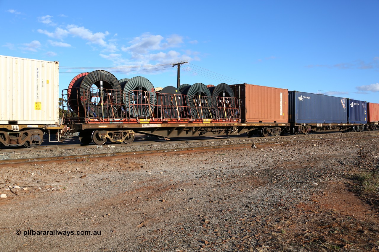 160528 8355
Parkeston, 5SP5 intermodal train, RQTY 670 originally built by Victorian Railways Newport Workshops between 1969-72 as part of a batch of two hundred FQX type container waggons, recoded to FQF type in Nov 1977, to VQCX in c1979, April 1994 to National Rail as RQCX. With a 20' Grace box GR 1031 and a 40' Simon flatrack FD 189 with cable drums.
Keywords: RQTY-type;RQTY670;Victorian-Railways-Newport-WS;FQX-type;