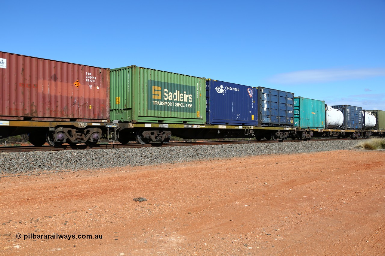 160528 8399
Binduli, intermodal train 6PM6, RRTY 696 container waggon, originally a Victorian Railways built FQX type, then recoded to VQCX type. Three 20' boxes, Sadleirs RCSB 5088, Cronos TINT 124807 and SCF side door SPDU 302253.
Keywords: RRTY-type;RRTY696;Victorian-Railways-Newport-WS;FQX-type;VQCX-type;