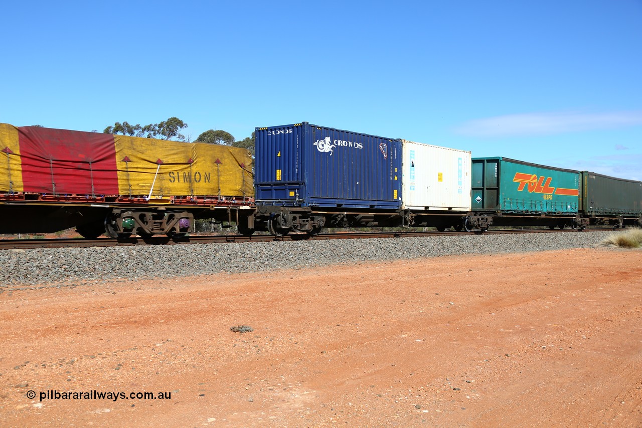 160528 8404
Binduli, intermodal train 6PM6, RRQY 8331 articulated five-unit container waggon built by Qiqihar Rollingstock Works in China in an order of forty one units in 2005/06 for Pacific National. Platforms 1 and 2 with a 20' Cronos bulker box 2EB0 type TSPD 122208 and Royal Wolf 20' 25G1 type RWPU 200971 and Toll-SPD 40' curtain sider 3NW 983.
Keywords: RRQY-type;RRQY8331;Qiqihar-Rollingstock-Works-China;