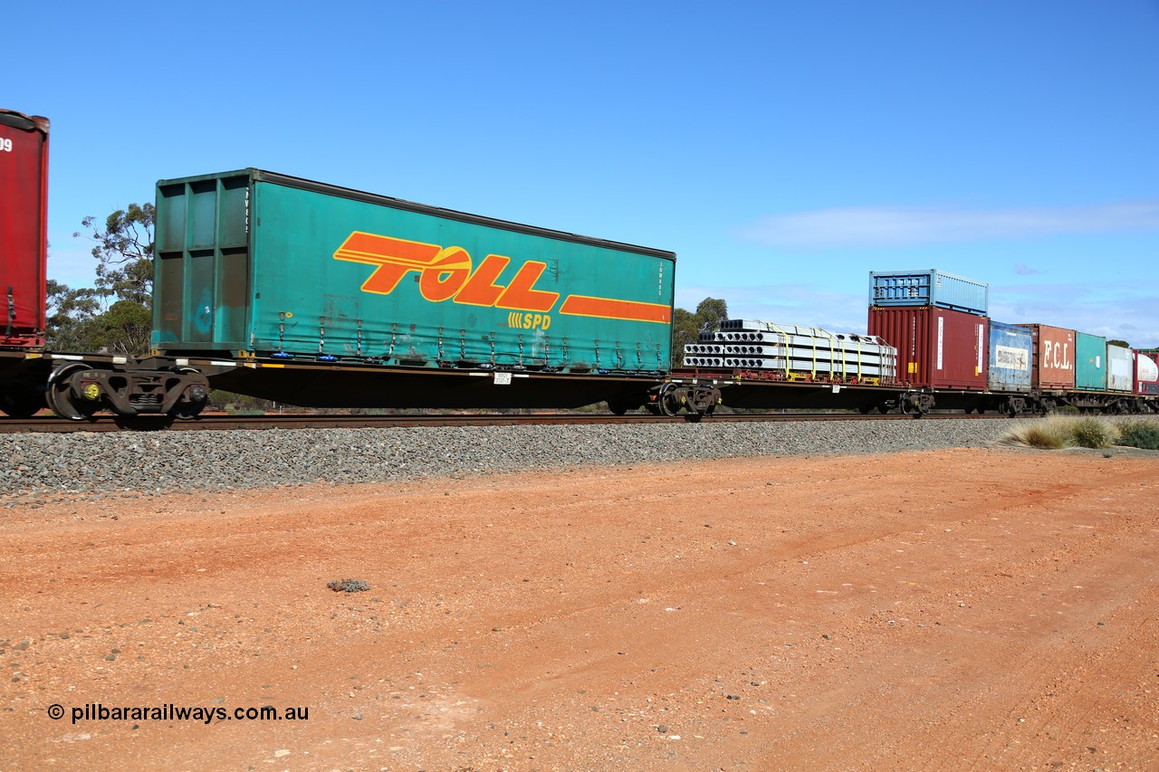 160528 8412
Binduli, intermodal train 6PM6, RRGY 7121 platforms 3, 4 and 5, loaded with a Toll 40' curtain sider 3NW 805, 40' flatrack KT 163, a Grace 2EG1 type 20' box GRRU 230148[4] with a RWTU 360250[7] low height double stacked and a Smorgon Steel open top RTP 2021. The RRBY waggon sets were built by AN Rail Islington Workshops in 1996/97 in a batch of fifty for National Rail, rebuilt and recoded to match RRGY type waggon sets.
Keywords: RRGY-type;RRGY7121;AN-Islington-WS;RRBY-type;