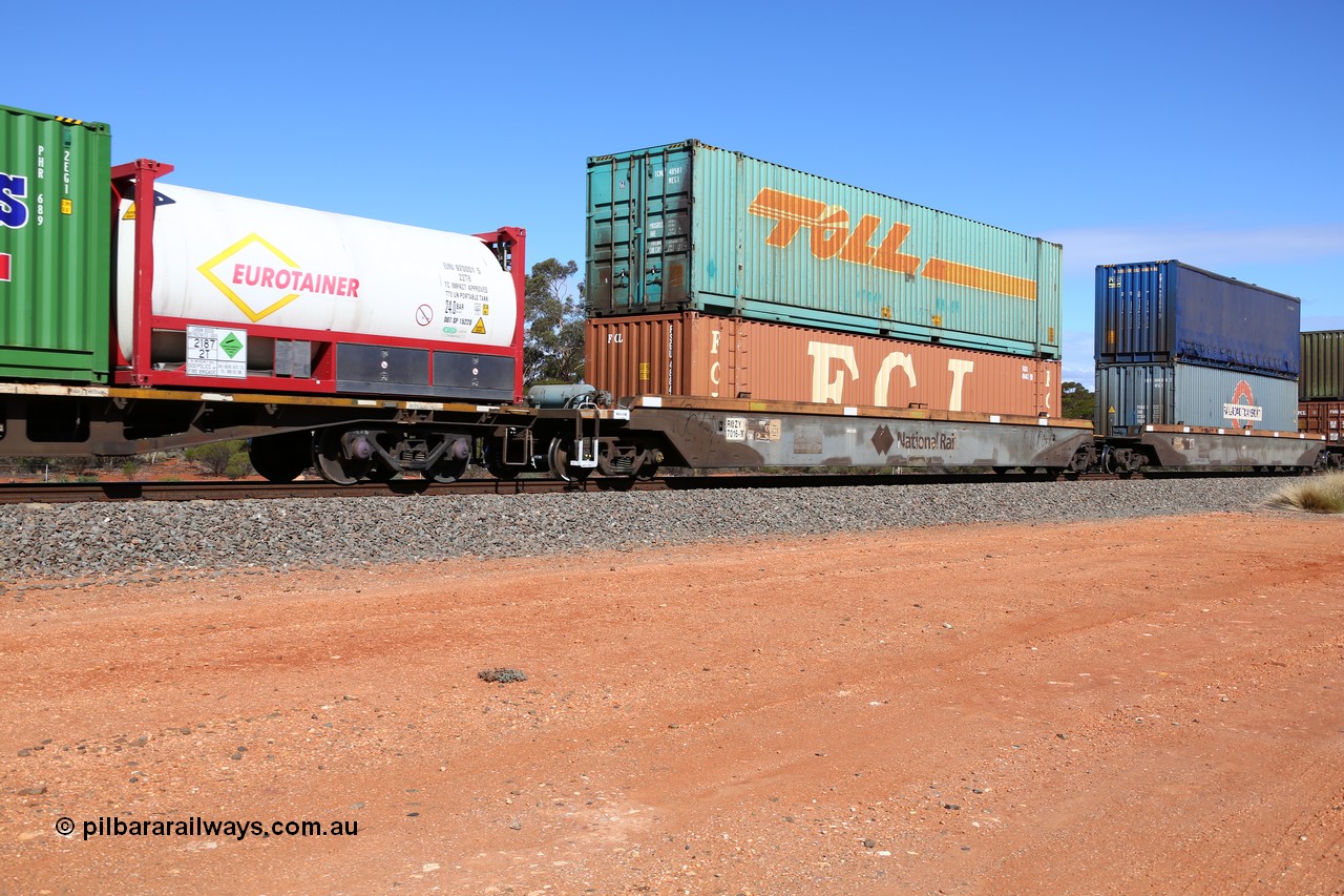 160528 8415
Binduli, intermodal train 6PM6, RRZY type five unit bar coupled well container waggon set RRZY 7016 platform 1, originally built by Goninan in a batch of twenty six RQZY type for National Rail, recoded when repaired. FCL 48' container FSGU 488425 double stacked with Toll 48' MEG1 type container TCML 48581.
Keywords: RRZY-type;RRZY7016;Goninan-NSW;RQZY-type;