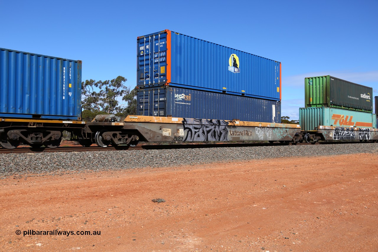 160528 8428
Binduli, intermodal train 6PM6, RQZY 7054 platform 1 of five unit bar coupled well container waggon set built in a batch of thirty two by Goninan NSW in 1995/96, loaded with an SCF sea2rail 40' 4EG1 type container TSPD 408102[3] double stacked with Royal Wolf 40' 4FG1 type container RWTU 941308[4].
Keywords: RQZY-type;RQZY7054;Goninan-NSW;