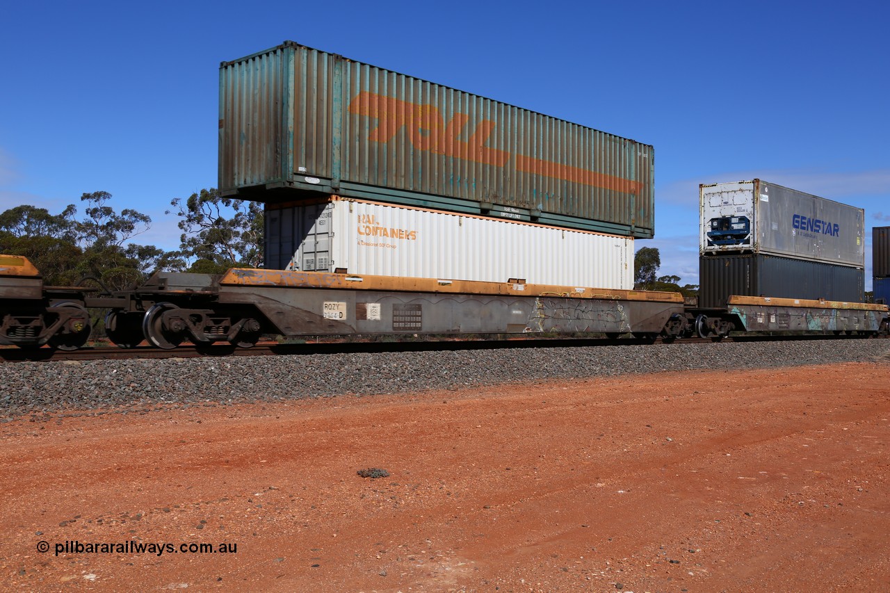 160528 8431
Binduli, intermodal train 6PM6, RQZY 7054 platform 4 of five unit bar coupled well container waggon set built in a batch of thirty two by Goninan NSW in 1995/96, loaded with an SCR Rail Containers 40' 4EG1 type container SCFU 412124 double stacked with a Toll 48' container TERF 48033.
Keywords: RQZY-type;RQZY7054;Goninan-NSW;