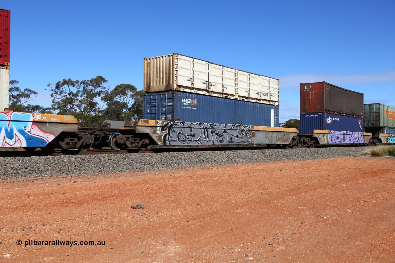 160528 8439
Binduli, intermodal train 6PM6, RQZY 7040 platform 4 of five unit bar coupled well container waggon set built in a batch of thirty two by Goninan NSW in 1995/96, loaded with a Sea2Rail 40' 4EG1 type container TSPD 408206[1] double stacked with a 40' half height side door container SCFU 607101[9].
Keywords: RQZY-type;RQZY7040;Goninan-NSW;