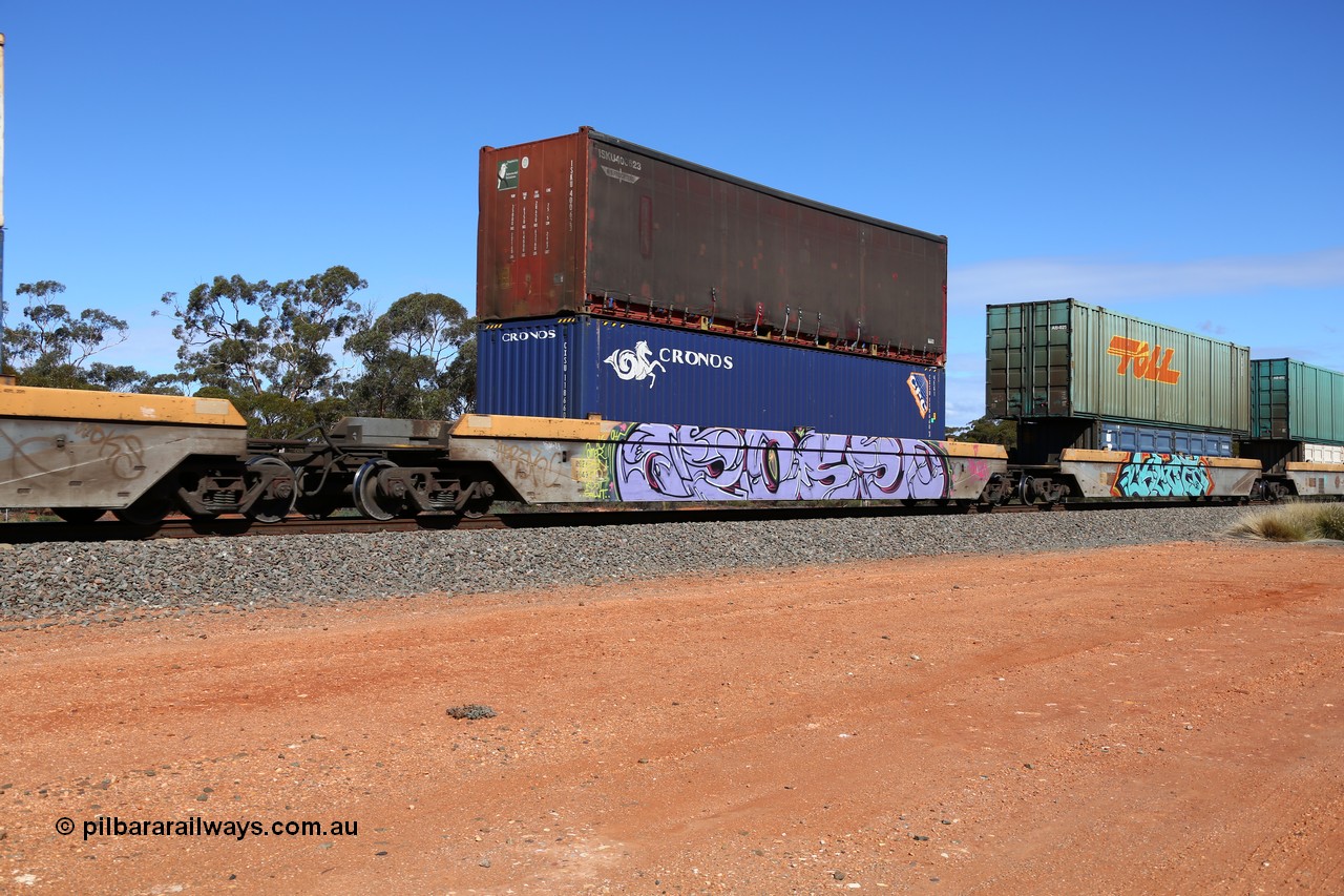 160528 8440
Binduli, intermodal train 6PM6, RQZY 7040 platform 3 of five unit bar coupled well container waggon set built in a batch of thirty two by Goninan NSW in 1995/96, loaded with a Cronos 40' 4EG1 type container CXSU 118660 double stacked with a K&S Freighters 40' curtainsider ISKU 400623.
Keywords: RQZY-type;RQZY7040;Goninan-NSW;