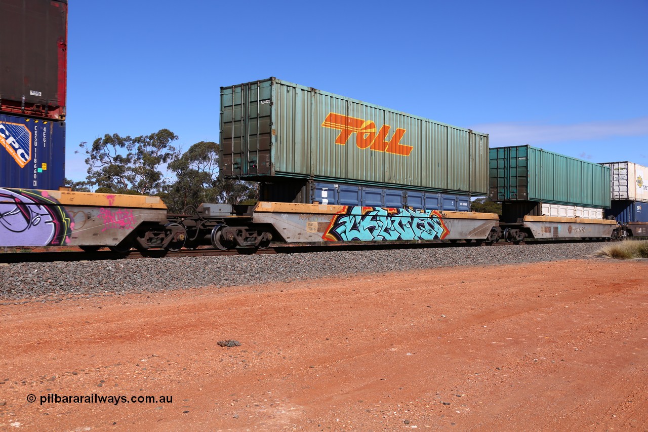 160528 8441
Binduli, intermodal train 6PM6, RQZY 7040 platform 2 of five unit bar coupled well container waggon set built in a batch of thirty two by Goninan NSW in 1995/96, loaded with a 40' half height side door container SCFU 607066[6] double stacked with a Toll 53' car container AB 025.
Keywords: RQZY-type;RQZY7040;Goninan-NSW;