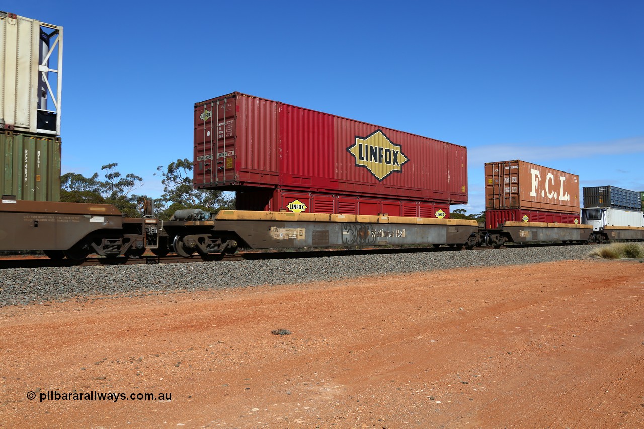 160528 8453
Binduli, intermodal train 6PM6, RRZY type five unit bar coupled well container waggon set RRZY 7039 platform 5, one of thirty two waggon sets built by Goninan in 1995-96 for National Rail as the RQZY type and recoded when repaired. Loaded with a 40' Linfox half height side door container LSDU and double stacked with a Linfox 53' PFG1 type car container DRC 5460.
Keywords: RRZY-type;RRZY7039;Goninan-NSW;RQZY-type;