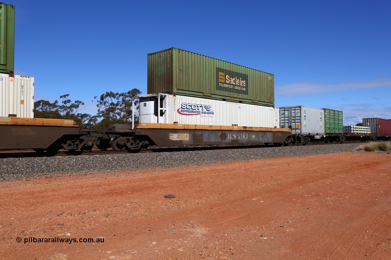 160528 8457
Binduli, intermodal train 6PM6, RRZY type five unit bar coupled well container waggon set RRZY 7039 platform 1, one of thirty two waggon sets built by Goninan in 1995-96 for National Rail as the RQZY type and recoded when repaired. Loaded with a 46' 6