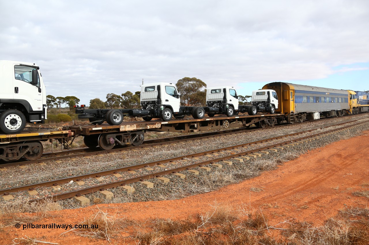 160529 8764
Parkeston, 6MP4 intermodal train, RQKY 3083 container waggon, originally built in a batch of fifty by Carmor Engineering SA as RMX type in 1976, recoded to AQMX, then AQSY. Loaded with three small Isuzu cab-chassis trucks.
Keywords: RQKY-type;RQKY3083;Carmor-Engineering-SA;RMX-type;AQMX-type;AQSY-type;