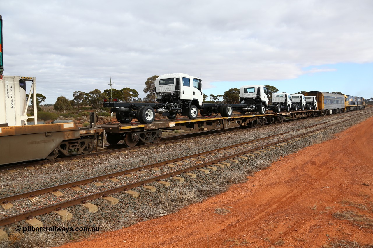 160529 8765
Parkeston, 6MP4 intermodal train, RRKY 4335 container waggon, originally built in a batch of one hundred and fifty by Perry Engineering SA in 1975 as RMX type, recoded to AQMX, and RQKY, loaded with two Isuzu cab-chassis trucks.
Keywords: RRKY-type;RRKY4335;Perry-Engineering-SA;RMX-type;AQMX-type;RQKY-type;