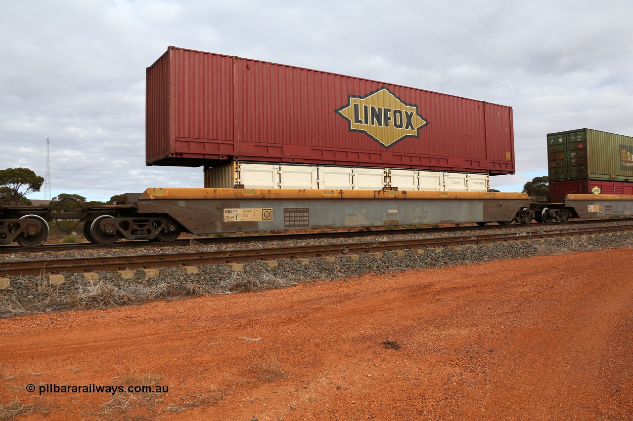 160529 8769
Parkeston, 6MP4 intermodal train, RRZY 7049 platform 3 of 5-pack well waggon set, one of thirty two sets built by Goninan NSW in 1995-96 for National Rail as RQZY type, recoded to RRZY when repaired with an SCF 40' half height side door container SCFU 607095 and a Linfox 53' PFG1 type box DRC 54##.
Keywords: RRZY-type;RRZY7049;Goninan-NSW;RQZY-type;