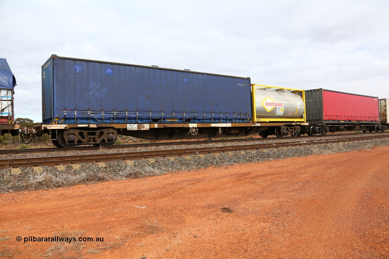 160529 8778
Parkeston, 6MP4 intermodal train, RQBY 15032, one of seventy that Comeng NSW built as OCY type in 1974-75, recoded to NQOY, then NQSY and NQBY loaded with a Royal Wolf 40' curtainsider RWTU 903063 and a CIMC Tank built 20' ISO tanktainer 22K2 type Eurotainer EURU 114496 with Ammonium Nitrate Emulsion.
Keywords: RQBY-type;RQBY15032;Comeng-NSW;OCY-type;NQOY-type;NQBY-type;