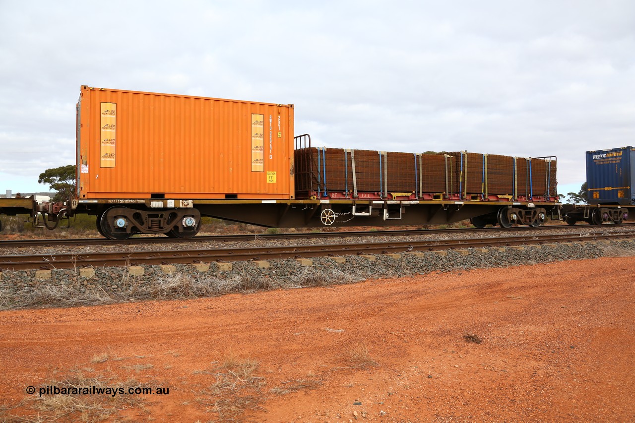 160529 8797
Parkeston, 6MP4 intermodal train, RQFY 73 container waggon, built by Victorian Railways Bendigo Workshops in 1980 as a batch of seventy five VQFX type skeletal container waggons, recoded to VQFY c1985, then RQFF May 1994, then 2CM bogies fitted in Aug 1995 and current code Jan 1996, loaded with a K+S 40' flatrack KT 131 loaded with reo mesh and an Allied Pickfords 20' 25G1 type box RWTU 966291[3].
Keywords: RQFY-type;RQFY73;Victorian-Railways-Bendigo-WS;VQFX-type;