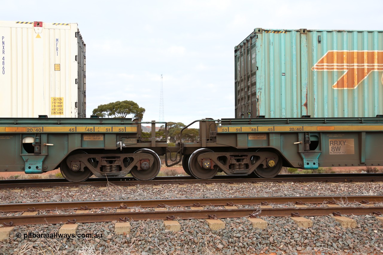 160529 8803
Parkeston, 6MP4 intermodal train, RRXY 8 shows the bar coupling and pipes between platform 2 and 3 of 5-pack well waggon set, one of eleven built by Bradken Qld in 2002 for Toll from a Williams-Worley design.
Keywords: RRXY-type;RRXY8;Williams-Worley;Bradken-Rail-Qld;