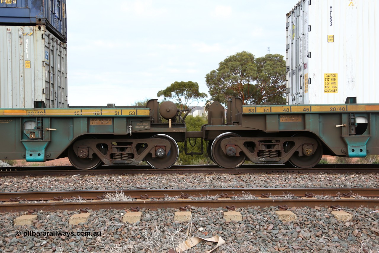 160529 8806
Parkeston, 6MP4 intermodal train, RRXY 8 shows the bar coupling and pipes between platform 4 and 5 of 5-pack well waggon set, one of eleven built by Bradken Qld in 2002 for Toll from a Williams-Worley design.
Keywords: RRXY-type;RRXY8;Williams-Worley;Bradken-Rail-Qld;