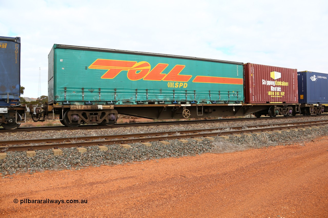 160529 8816
Parkeston, 6MP4 intermodal train, RQFY 7 container waggon, built by Victorian Railways Bendigo Workshops in April 1978 in a batch of forty QMX type skeletal container waggons, in July 1980 re-coded to VQFX, in October 1994 re-coded to RQFX and 2CM bogies fitted.
Keywords: RQFY-type;RQFY7;Victorian-Railways-Bendigo-WS;QMX-type;