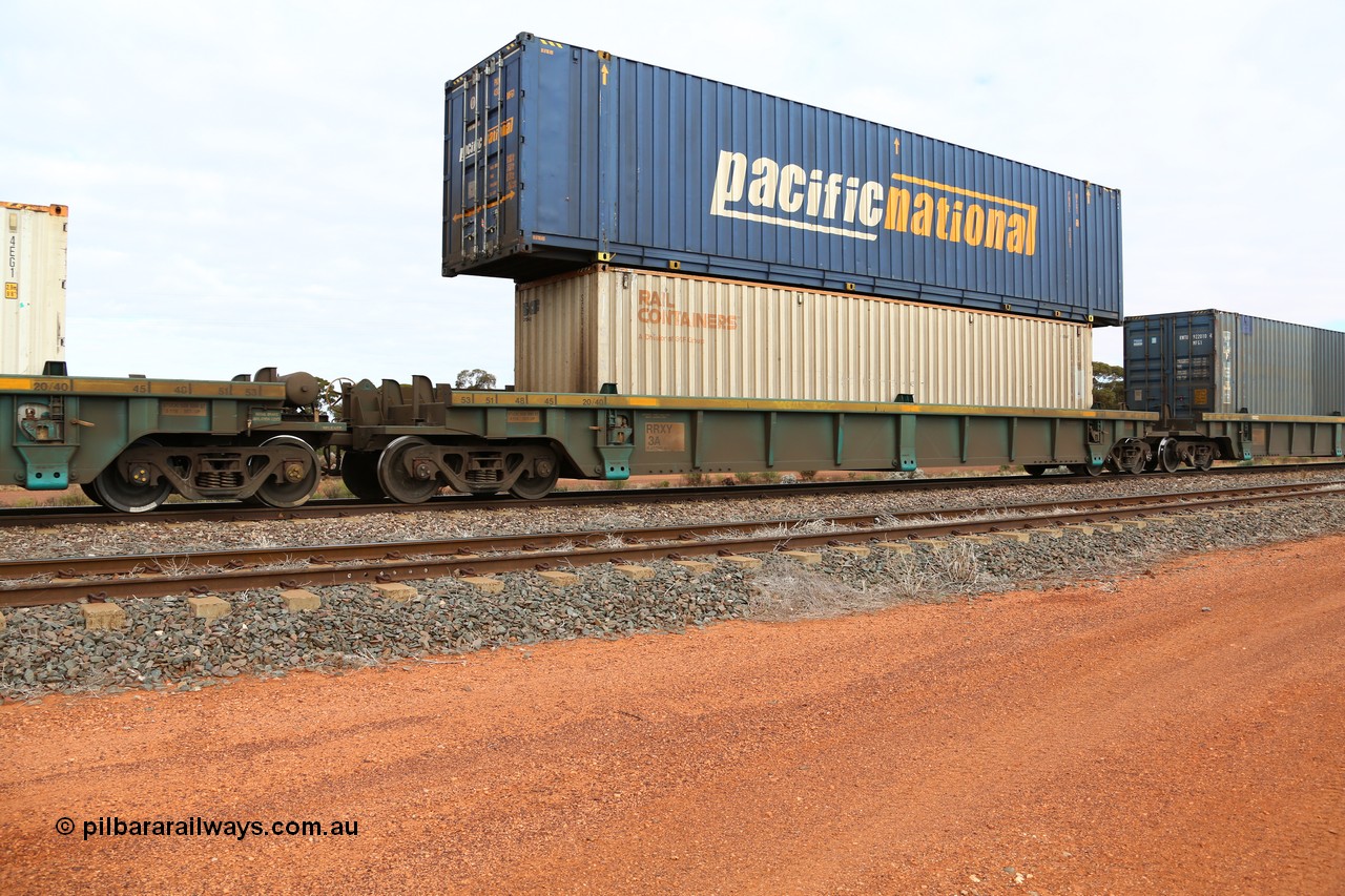 160529 8833
Parkeston, 6MP4 intermodal train, RRXY 3 platform 2 of 5-pack well waggon set, one of eleven built by Bradken Qld in 2002 for Toll from a Williams-Worley design with a 40' Rail Containers box SCFU 410204 in the well and 48' Pacific National box PNXL 4301 on top.
Keywords: RRXY-type;RRXY3;Williams-Worley;Bradken-Rail-Qld;