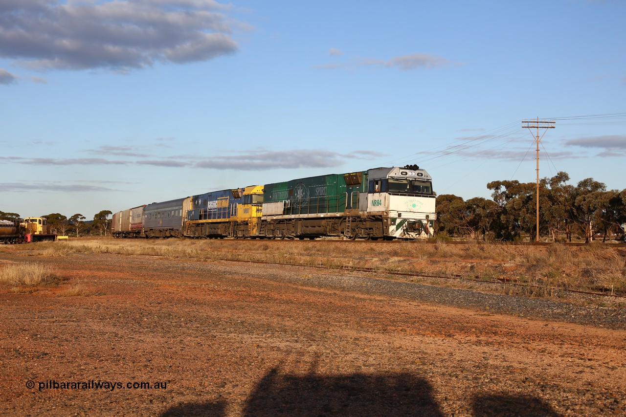 160529 9079
Parkeston, 7MP7 priority service train powers around the curve as it climbs the grade to Kalgoorlie behind a pair of Goninan built GE model Cv40-9i NR class units NR 84 serial 7250-04/97-286 and NR 80 serial 7250-03/97-282. NR 84 wears the Southern Spirit livery and is known as the Minty. Off to the left is Loongana Lime shunt loco DE 49, a former BHP 37 class unit built by Goninan in 1961 based on GE 80 ton switcher, serial 4970-013.
Keywords: NR-class;NR84;NR80;Goninan;GE;Cv40-9i;7250-04/97-286;7250-03/97-282;