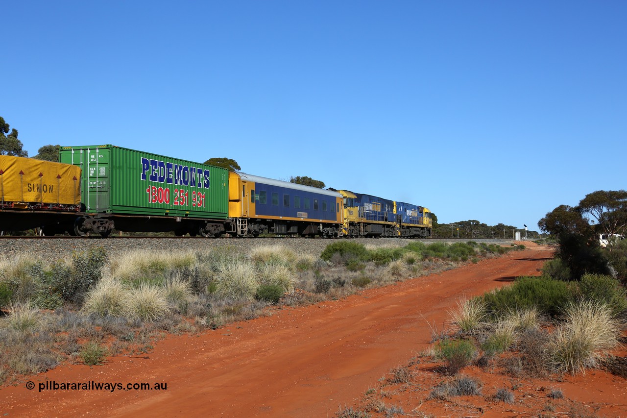 160530 9249
Binduli, 7SP3 intermodal service west bound, crew accommodation coach BRS 223, originally built by Victorian Railways Newport Workshops as an AS class AS 12, then ABS 1, BRS 3. The Pedemonts 40' container PHR 415 is on RRAY 7239, an ABB Engineering built unit from 1996-2000.
Keywords: BRS-type;BRS223;Victorian-Railways-Newport-WS;AS-type;AS12;ABS-type;ABS1;BRS-type;BRS3;