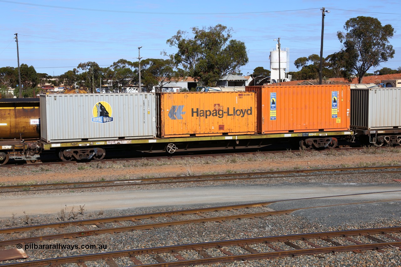 160531 9875
West Kalgoorlie, container waggon RQTY 1 originally built by SAR at Islington Workshops between 1970-72 as part of a batch of seventy two FQX type container waggons. Loaded with three 20' containers, Royal Wolf 22G1 type RWMC 818005, Hapag-Lloyd 22G1 type RSSU 222095 and Royal Wolf 25G1 type RWTU 965926. 31st of May 2016.
Keywords: RQTY-type;RQTY1;SAR-Islington-WS;FQX-type;