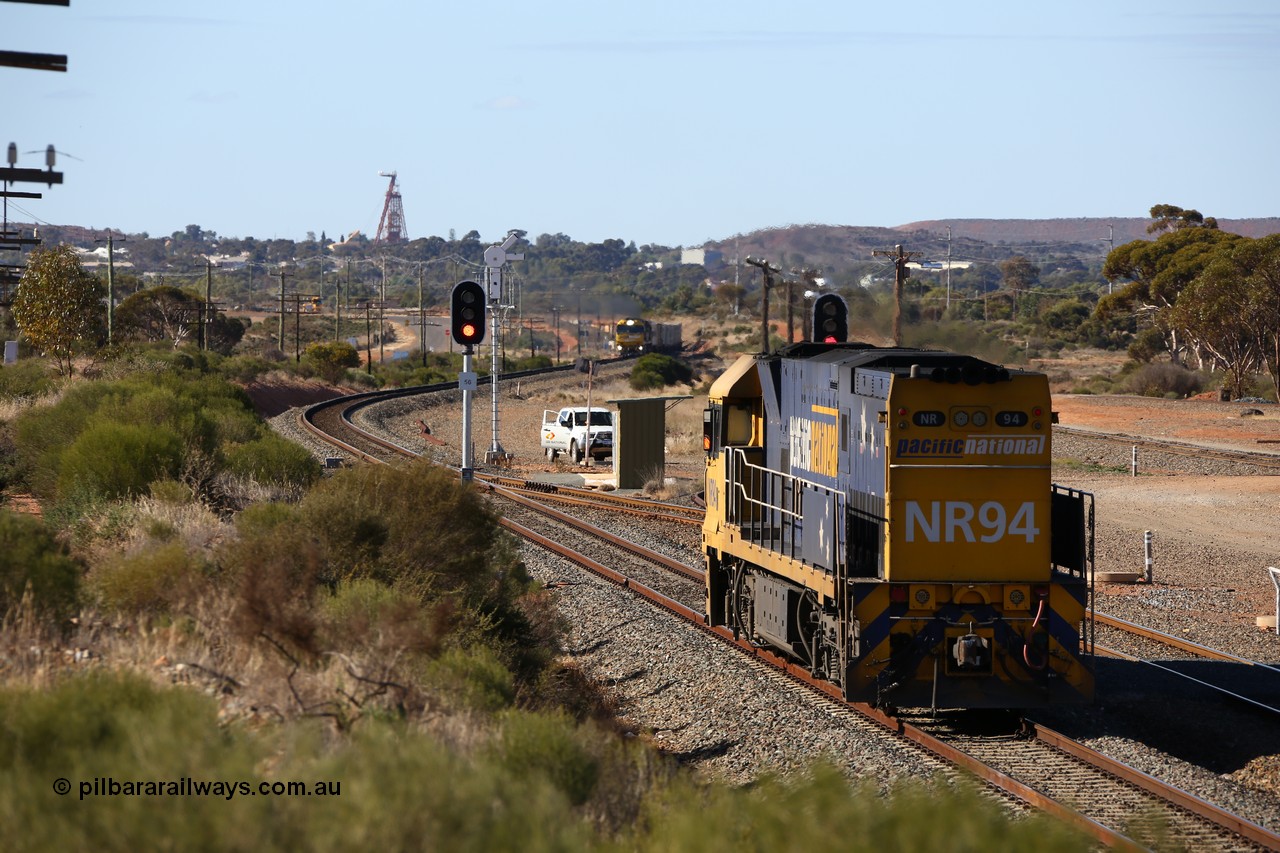 160531 9885
West Kalgoorlie, Pacific National's Goninan built GE model Cv40-9i NR class unit NR 94 serial 7250-06/97-300, shunts off 3PM4 steel train to collect the loading and crew coach sitting in the yard. 31st of May 2016.
Keywords: NR-class;NR94;Goninan;GE;Cv40-9i;7250-06/97-300;