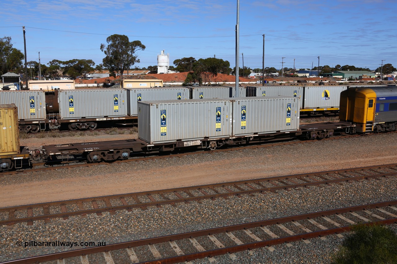 160531 9895
West Kalgoorlie, 1MP2 steel train, RQJW type container waggon RQJW 21976, leader of the third batch of twenty five JCW type 80' container waggons built in 1980 by Mittagong Engineering NSW, recoded to NQJW, then to National Rail in 1994/95. Loaded with two 22G1 type 20' Royal Wolf boxes RWMC 815858 and RWMC 815914.
Keywords: RQJW-type;RQJW21976;Mittagong-Engineering-NSW;JCW-type;NQJW-type;