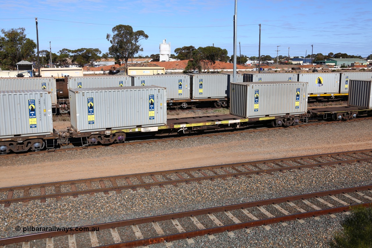 160531 9900
West Kalgoorlie, 1MP2 steel train, container waggon NQSY 35015, one of a hundred built by Goninan NSW as OCY type in 1975, then NQOY, with two 20' Royal Wolf containers, RWMC 815900 and RWMC 815854.
Keywords: NQSY-type;NQSY35015;Goninan-NSW;OCY-type;NQOY-type;