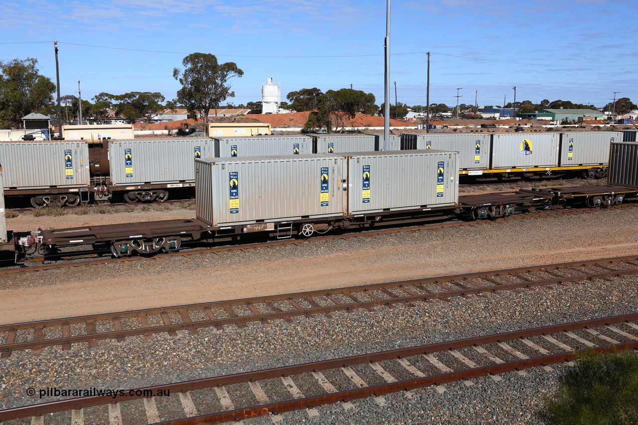 160531 9905
West Kalgoorlie, 1MP2 steel train, container waggon RQWW 22022, one of thirty two JCW type waggons built by Comeng NSW in 1973-74, loaded with two 20' Royal Wolf containers, RWMC 815948 and RWMC 815868.
Keywords: RQWW-type;RQWW22022;Comeng-NSW;JCW-type;NQJW-type;