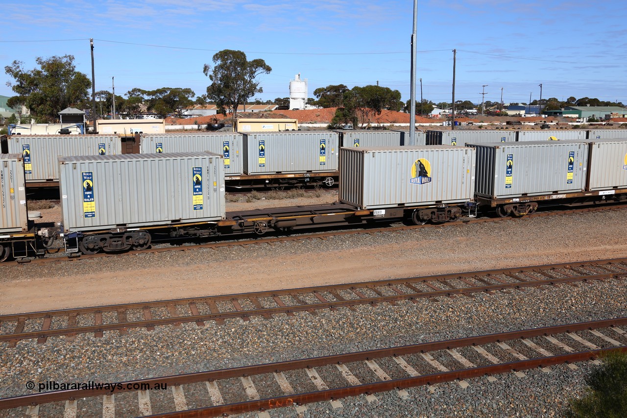 160531 9907
West Kalgoorlie, 1MP2 steel train, container waggon RQHY 7002, one of seventy eight built in 2005 by Qiqihar Rollingstock Works in China, with two 20' Royal Wolf containers RWMC 815924 and RWMC 817981.
Keywords: RQHY-type;RQHY7002;Qiqihar-Rollingstock-Works-China;