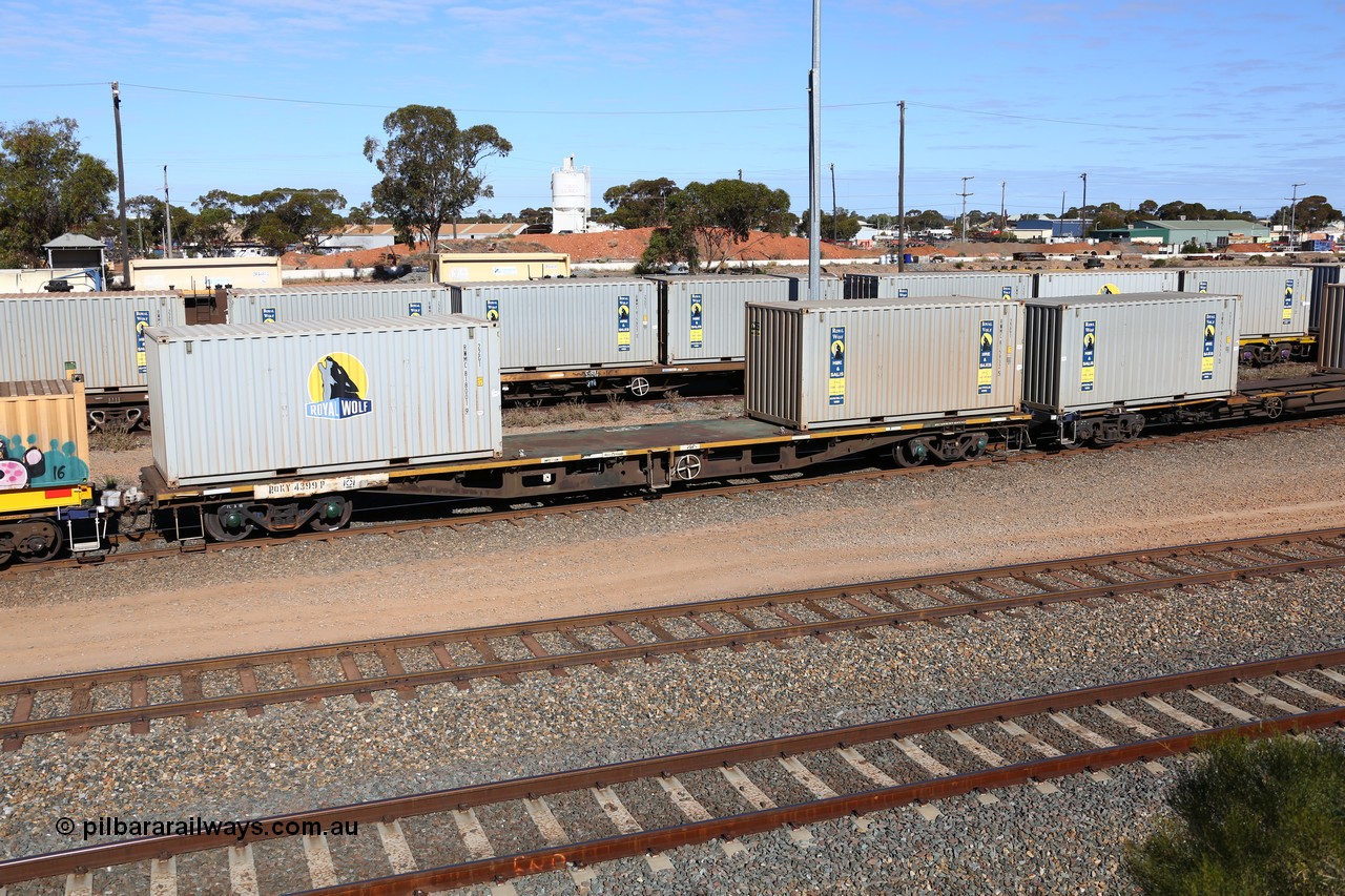 160531 9908
West Kalgoorlie, 1MP2 steel train, container waggon RQKY 4399, still with a green AN deck, with two 20' Royal Wolf containers RWMC 818001 and RWMC 815932.
Keywords: RQKY-type;RQKY4399;