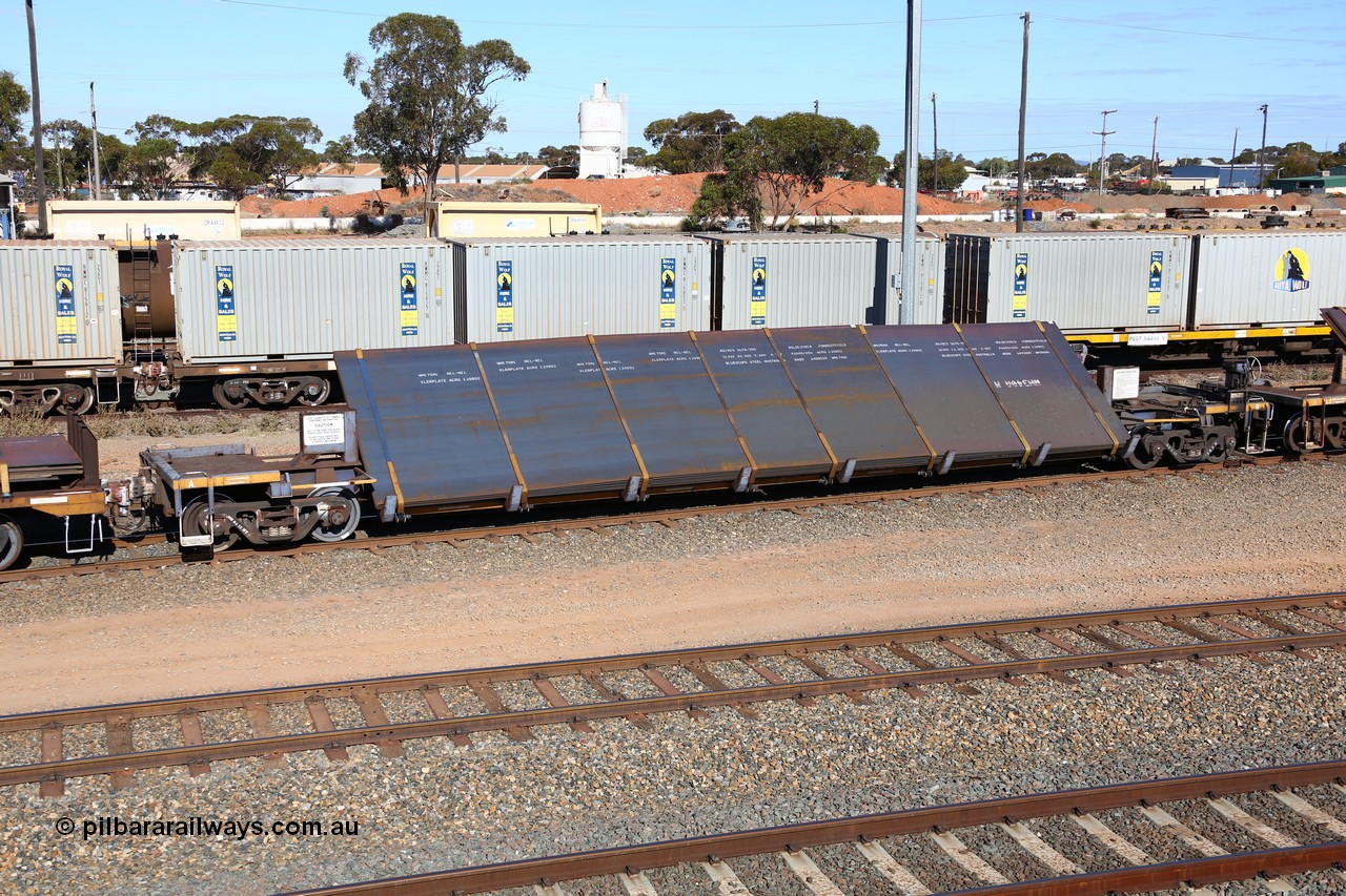 160531 9924
West Kalgoorlie, 1MP2 steel train, RKYY type wide steel plate tilt waggon RKYY 7105, one of twenty seven units built by AN Rail Islington Workshops in 1995-96. Loaded with steel plate.
Keywords: RKYY-type;RKYY7105;AN-Islington-WS;
